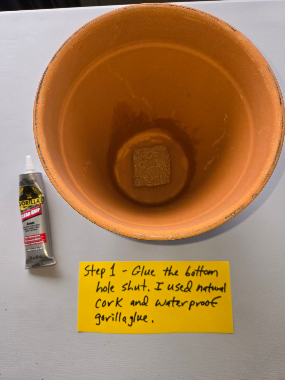 Plugging the drain hole in the terracotta pot